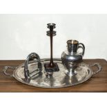 A silver plated tray, jug, candlestick and stirrups