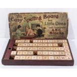 A vintage Easy Spelling Board learning game
