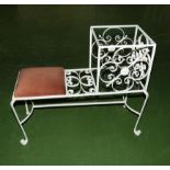 A wrought iron hall/telephone seat