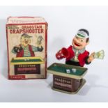 Vintage 1950's battery operated Cragstan Crapshooter battery operated tin toy