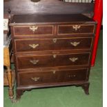 A Georgian mahogany chest of drawers on splayed bracket feet af.