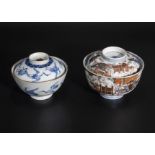 Two Meiji period decorated tea bowls with lids, underglazed blue with flying cranes