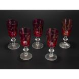 Five etched cranberry glass sherry glasses