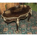 A French centre table with brass inlays and mounts.