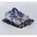 A Victorian blue and white pottery cheese dish