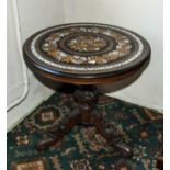An early 19th century Florentine rosewood, ivory and mother of pearl marquetry inlaid table top on a