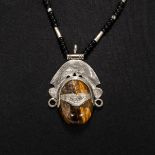 A Tuareg tiger eye and silver necklace from Mali