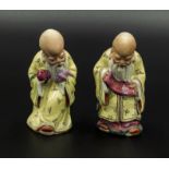 Two small Chinese pottery figures of sages