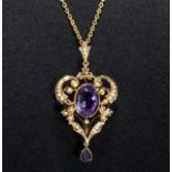 A large 9ct gold amethyst and seed pearl pendant/brooch and chain (11gms)