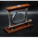 A Victorian oak and silver plated mounts gong with Corinthian supports.