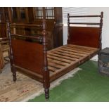 A Victorian mahogany single bed.