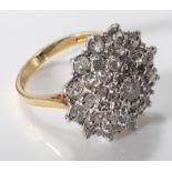 An 18ct yellow and white gold large diamond cluster ring (2-3ct)