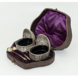 A boxed silver plate Orkney cradle style pair of salts