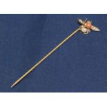 A 9ct gold pin with fly set with coral and seed pearls