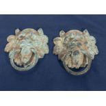 Two bronze Roman style lion head handles