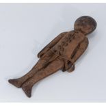 An early leather doll made as a teaching aid for children to learn about lacing and tying.