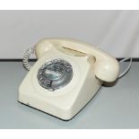 A vintage ivory telephone.