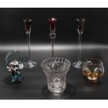 Three glass candlesticks, a bowl, basket and a vase