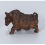 A hardwood carving of a Sumatran rhino netsuke