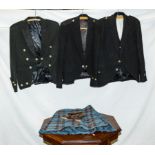 Two Argyle jackets and a waistcoat, a Prince Charlie jacket, kilt together with a sporran and shoes