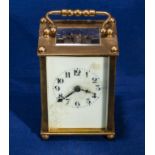 A small brass carriage clock