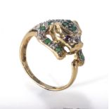 A 14ct gold emerald and diamond Cartier style cat ring