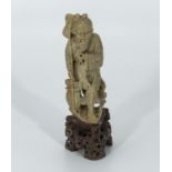 Q'ing dynasty hardstone carving of a fisherman and catch