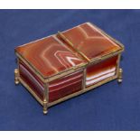 A small gilt trinket box set with cornelian panels A/F
