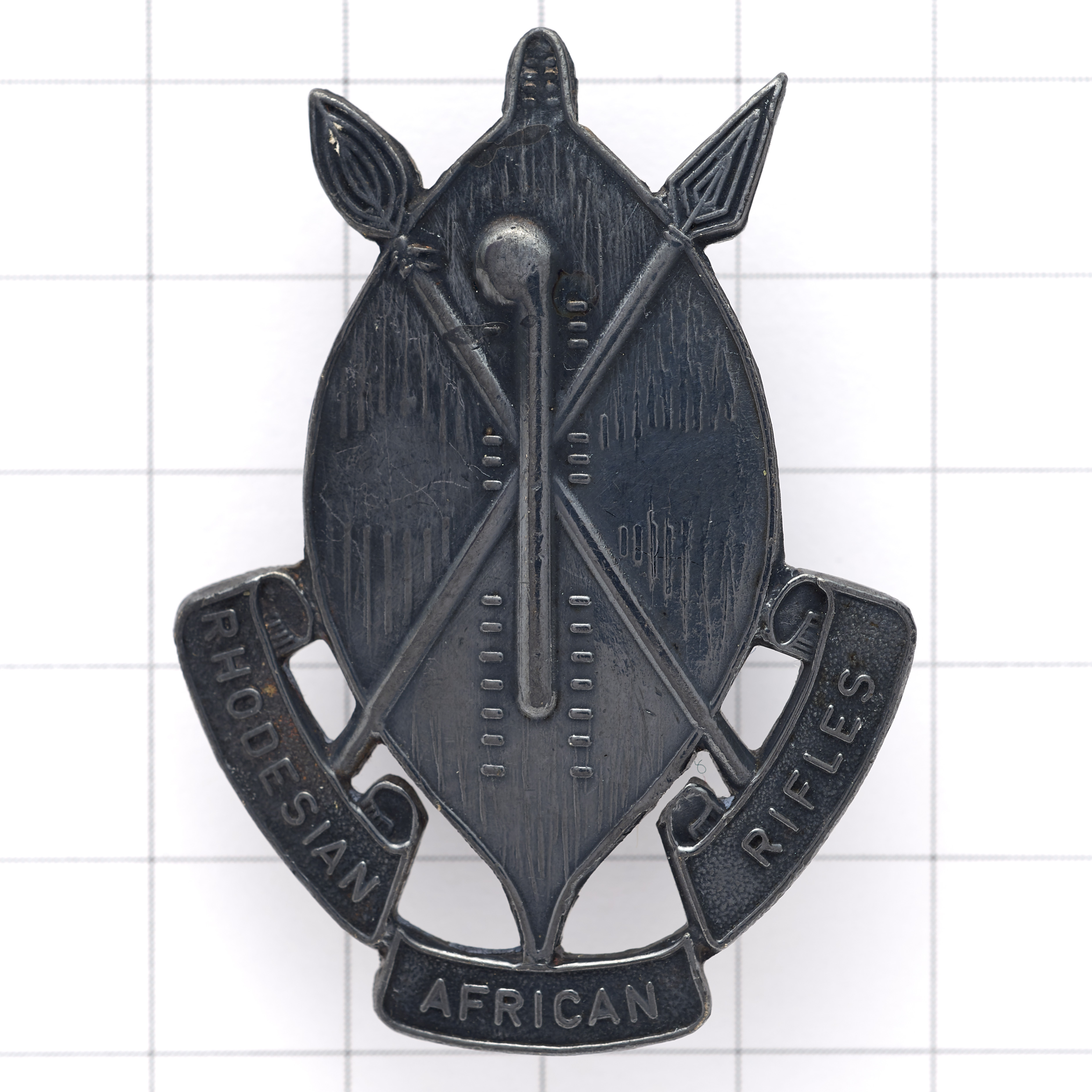 Rhodesian African Rifles Officer’s silver cap badge.