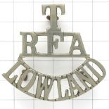 T / RFA / LOWLAND white metal Royal Field Artillery Scottish shoulder title circa 1908-20.