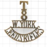 T / 8 / W. YORK / LEEDS RIFLES blackened brass shoulder title circa 1908-21.