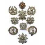 9 assorted Scottish glengarry badges + sporran badge.