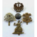 4 assorted cap badges and an Officer’s button.