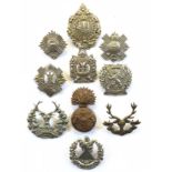 10 assorted Scottish glengarry badges.