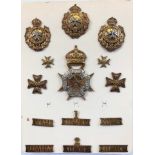 Royal Malta Militia helmet plate, cap badges, collars and titles.