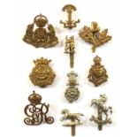 10 Yeomanry cap badges.