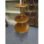 A modern mahogany three tier dumb waiter