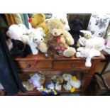 A quantity of modern soft toy bears and dogs to include a build a bear with accessories, together