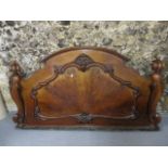 A Victorian mahogany bedhead, 60 w with carved decoration and a Victorian mahogany dining chair