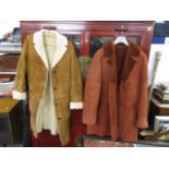 A gents' sheepskin 3/4-length car coat, with another