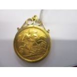 A George V gold half-sovereign 1912 in a 9ct gold frame