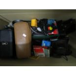 A selection of camera accessories to include leather cases