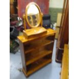 A modern pine bookcase, 39 h x 33 w and a pine dressing table mirror, 22h x 17w