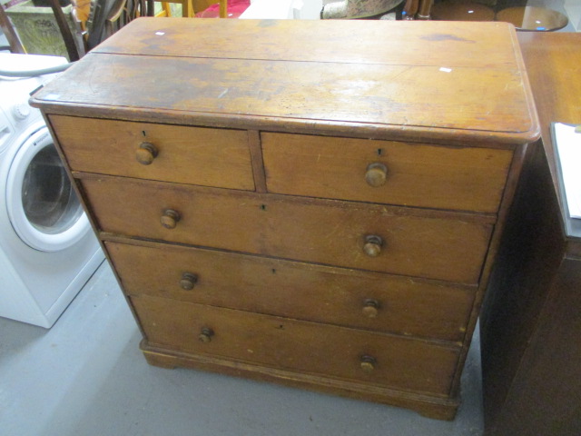 A 19th century pine chest of two short and three long drawers, 40 1/4 h x 41 1/2 w