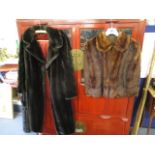 A black faux fur, three quarter length coat, together with a brown mink cape