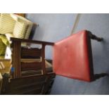 An early 20th century oak splat back dining chair with a red leather seat