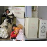 A selection of boxed and loose collectors dolls to include a boxed Shirley Temple doll and others