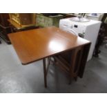 A mid 20th century teak gate leg table, 20 h x 57 w