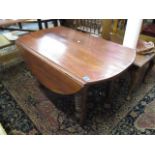 A modern eight leg low occasional drop leaf table, 22h x 40 w x 22