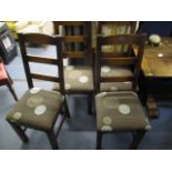 Four modern refectory style oak dining chairs with metal brackets to the seat